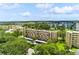 Aerial view of condo building with parking at 3620 Ironwood Cir # 405, Bradenton, FL 34209