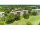 Aerial view of condo building next to golf course at 3620 Ironwood Cir # 405, Bradenton, FL 34209