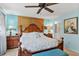 Spacious bedroom with king-size bed and ensuite bathroom at 3620 Ironwood Cir # 405, Bradenton, FL 34209