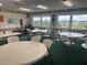 Community room with tables and chairs, great for gatherings at 3620 Ironwood Cir # 405, Bradenton, FL 34209