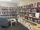 Community library with ample shelving and comfortable seating at 3620 Ironwood Cir # 405, Bradenton, FL 34209