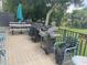 Outdoor patio with grill, picnic tables, and seating at 3620 Ironwood Cir # 405, Bradenton, FL 34209