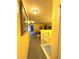 Upstairs hallway with access to bedrooms and loft at 3825 45Th W Ter # 104, Bradenton, FL 34210