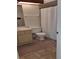 Clean bathroom with beige vanity, tiled floor, and white toilet at 4108 Carriage Way # 6, Sarasota, FL 34241