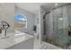 Spa-like bathroom with a walk-in shower and modern fixtures at 4250 Players Pl # 2622, Sarasota, FL 34238