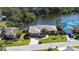 Aerial view of house and neighborhood by the water at 4503 Coral Lake Dr, Bradenton, FL 34210