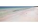 White sand beach with gentle waves at 4503 Coral Lake Dr, Bradenton, FL 34210