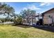 Spacious backyard with screened pool and outdoor shower at 4517 N Lake Dr, Sarasota, FL 34232