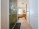 Bathroom with walk-in shower, clawfoot tub, and tile floor at 4517 N Lake Dr, Sarasota, FL 34232