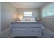 Bedroom with a queen-size bed and neutral decor at 4517 N Lake Dr, Sarasota, FL 34232