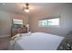 Bedroom with a queen bed and a flat screen TV at 4517 N Lake Dr, Sarasota, FL 34232