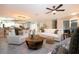 Open living room showcasing a white sofa and wooden coffee table at 4517 N Lake Dr, Sarasota, FL 34232