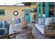 Outdoor patio area with comfortable wicker furniture and a tranquil vibe at 4517 N Lake Dr, Sarasota, FL 34232