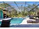 Enjoy this refreshing pool with screened enclosure and plenty of lounge space at 4517 N Lake Dr, Sarasota, FL 34232