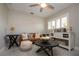 Relaxing sitting area featuring a brown leather couch and a console table at 4517 N Lake Dr, Sarasota, FL 34232