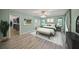 Spacious main bedroom with large closet and wood flooring at 4563 Trails Dr, Sarasota, FL 34232