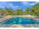 Inviting community pool with ample deck space at 4563 Trails Dr, Sarasota, FL 34232