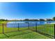 Enjoy the peaceful lake view from this backyard at 4852 Coastal Days Ln, Bradenton, FL 34211