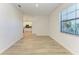 Bright dining room with wood-look tile floors at 4852 Coastal Days Ln, Bradenton, FL 34211