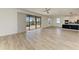 Bright living room with sliding glass doors leading to the pool at 4852 Coastal Days Ln, Bradenton, FL 34211