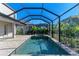 Enjoy this screened pool and spa with plenty of patio space at 4852 Coastal Days Ln, Bradenton, FL 34211