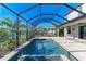 Inviting screened pool and spa with paved patio; perfect for relaxation at 4852 Coastal Days Ln, Bradenton, FL 34211