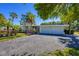 Mid-century modern home with attached two-car garage at 5602 Cape Leyte Dr, Sarasota, FL 34242