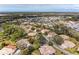 Wide aerial view of the home and neighborhood at 5613 Garden Lakes Dr, Bradenton, FL 34203