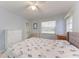 Bedroom with light walls, patio access and lots of light at 5613 Garden Lakes Dr, Bradenton, FL 34203