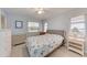 Bright bedroom with light walls and a comfortable bed at 5613 Garden Lakes Dr, Bradenton, FL 34203