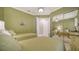 Bright bedroom with twin beds and mirrored closet doors at 5781 Girona Pl, Sarasota, FL 34238