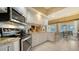 Well-equipped kitchen featuring stainless steel appliances and granite countertops at 5781 Girona Pl, Sarasota, FL 34238