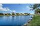 Picturesque lake view, bridge, and tranquil setting at 5781 Girona Pl, Sarasota, FL 34238