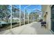 Large screened patio with grill and lake view at 5781 Girona Pl, Sarasota, FL 34238