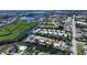 Aerial view showing home's location on a canal with water access at 603 Barnes Pkwy, Nokomis, FL 34275