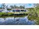 Backyard with canal access and private dock at 603 Barnes Pkwy, Nokomis, FL 34275