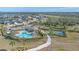 Aerial view showing community pool, playground and basketball court at 6347 Grandview Hill Ct, Bradenton, FL 34203