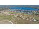 Aerial view of community with large park and walking paths at 6347 Grandview Hill Ct, Bradenton, FL 34203