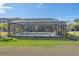 Relaxing screened pool and patio area, perfect for outdoor entertaining at 6347 Grandview Hill Ct, Bradenton, FL 34203