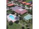 Aerial view of community pool and shuffleboard courts at 6405 Auburn Ave # 8, Bradenton, FL 34207