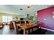 Dining area with a wooden table and built in cabinetry at 6405 Auburn Ave # 8, Bradenton, FL 34207