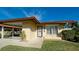 Front view of a charming house with a covered entryway at 6405 Auburn Ave # 8, Bradenton, FL 34207