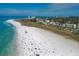 Expansive aerial view of Siesta Beach, showing the white sand and many visitors at 6429 Hollywood Blvd, Sarasota, FL 34231