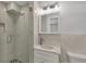 Updated bathroom with a glass shower, quartz vanity, and modern fixtures at 6429 Hollywood Blvd, Sarasota, FL 34231