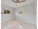 Bright bedroom with tile floors and large windows at 6429 Hollywood Blvd, Sarasota, FL 34231