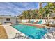 Refreshing pool with ample lounge chairs and lush landscaping at 6429 Hollywood Blvd, Sarasota, FL 34231