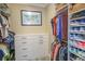 Spacious walk-in closet with ample shelving and hanging space at 6730 Haverhill Ct, Bradenton, FL 34202