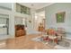 Elegant dining room with hardwood floors and ample natural light at 6790 Paseo Castille, Sarasota, FL 34238