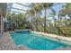 Inviting pool area with spa and screened enclosure at 6790 Paseo Castille, Sarasota, FL 34238