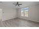 Large bedroom with ceiling fan and natural light at 7041 Alan Blvd, Punta Gorda, FL 33982